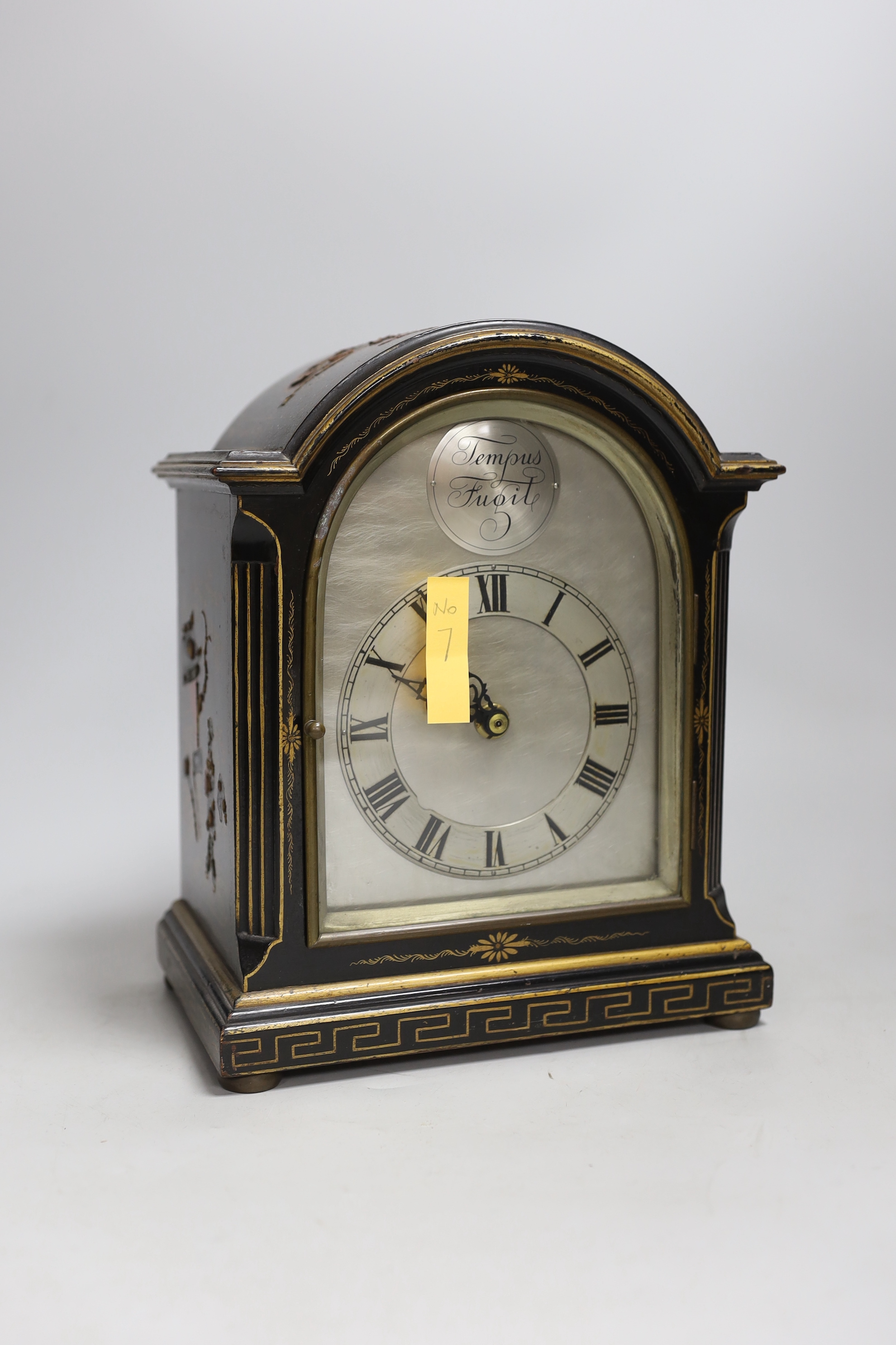 A reproduction chinoiserie cased mantel clock marked Tempus Fugit, 26cm